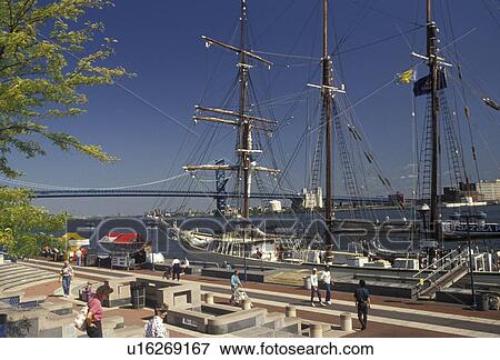 Stock Photo -  Philadelphia, Pennsylvania, Penn's Landing, Gazela of Philadelphia is docked on the waterfront of Historic Penn's Landing along the Delaware River in Philadelphia in the state of Pennsylvania.. Fotosearch