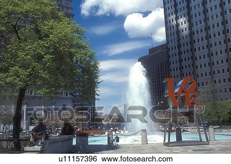 Stock Photograph -  Philadelphia, Pennsylvania, The red LOVE Statue and fountain at Kennedy Plaza in downtown Philadelphia, Pennsylvania.. Fotosearch