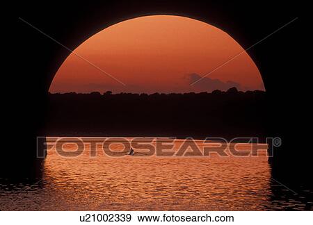 Philadelphia, Schuylkill River, bridge, Pennsylvania, Fairmount Park, Rowing on the Schuylkill River under an arched bridge at sunset in Philadelphia in the state of Pennsylvania. View Large Photo Image Stock Photo - Philadelphia, Schuylkill River, bridge, Pennsylvania, Fairmount Park, Rowing on the Schuylkill River under an arched bridge at sunset in Philadelphia in the state of Pennsylvania. . Fotosearch