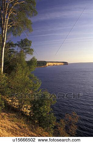 Pictured Rocks, Lake Superior, Upper Peninsula, U. P Michigan, Scenic view of the sandstone cliffs on Lake Superior at Pictured Rocks National Lakeshore in Munising in the state of Michigan. View Large Photo Image Stock Image - Pictured Rocks, Lake Superior, Upper Peninsula, U. P Michigan, Scenic view of the sandstone cliffs on Lake Superior at Pictured Rocks National Lakeshore in Munising in the state of Michigan.. Fotosearch