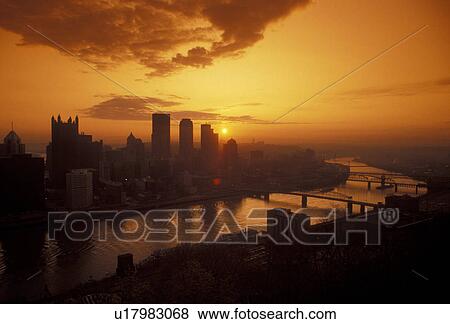 Pittsburgh, aerial, skyline, sunrise, Pennsylvania, Scenic view of the skyline of Pittsburgh along the Monongahela River at sunrise in the state of Pennsylvania. View Large Photo Image Stock Photo - Pittsburgh, aerial, skyline, sunrise, Pennsylvania, Scenic view of the skyline of Pittsburgh along the Monongahela River at sunrise in the state of Pennsylvania.. Fotosearch
