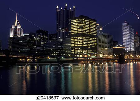 Pittsburgh, skyline, downtown, Pennsylvania, The illuminated downtown skyline of Pittsburgh reflects in the calm water of the Monongahela River at night in the state of Pennsylvania. View Large Photo Image Stock Photo - Pittsburgh, skyline, downtown, Pennsylvania, The illuminated downtown skyline of Pittsburgh reflects in the calm water of the Monongahela River at night in the state of Pennsylvania.. Fotosearch