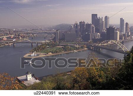 Pittsburgh, skyline, Pennsylvania, Scenic view of the downtown skyline of Pittsburgh where the Allegheny River and the Monongahela River meet to form the Ohio River from the overlook at Mount Washington in the state of Pennsylvania. The junction of the t View Large Photo Image Stock Image - Pittsburgh, skyline, Pennsylvania, Scenic view of the downtown skyline of Pittsburgh where the Allegheny River and the Monongahela River meet to form the Ohio River from the overlook at Mount Washington in the state of Pennsylvania. The junction of the t. Fotosearch