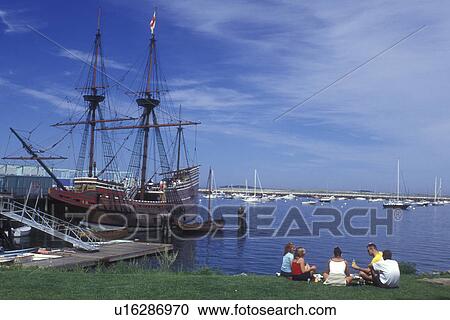 Plymouth, Massachusetts, Atlantic Ocean, A family picnics on the lawn overlooking the Plymouth Harbor. The Mayflower II is docked in the harbor. View Large Photo Image Stock Image - Plymouth, Massachusetts, Atlantic Ocean, A family picnics on the lawn overlooking the Plymouth Harbor. The Mayflower II is docked in the harbor. . Fotosearch