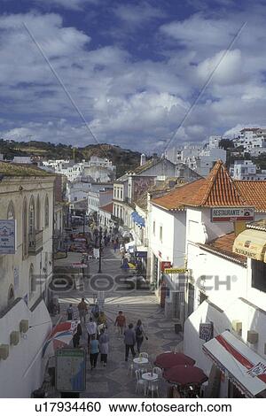 Stock Image -  Portugal, Algarve, Downtown district of the summer resort town of Albufeira along the Algarve Coast . Fotosearch