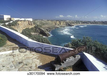 Portugal, Algarve, fort, A cannon on the stonewall of Fortaleza de Sagres faces the Atlantic Ocean along the Algarve Coast. View Large Photo Image Picture - Portugal, Algarve, fort, A cannon on the stonewall of Fortaleza de Sagres faces the Atlantic Ocean along the Algarve Coast.. Fotosearch