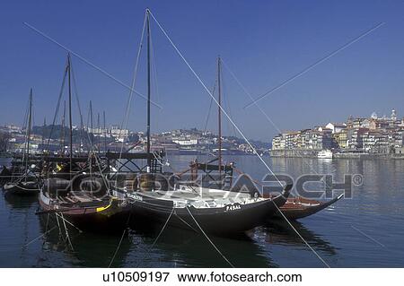 Portugal, Porto, Barcos rabelos (boats) on the Rio Douro in Porto used to transport Port Wine barrels View Large Photo Image Stock Photo - Portugal, Porto, Barcos rabelos (boats) on the Rio Douro in Porto used to transport Port Wine barrels . Fotosearch
