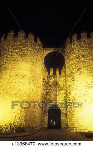 Portugal, Serpa, The gate to fortified town of Serpa is illuminated at night (evening) View Large Photo Image Stock Image - Portugal, Serpa, The gate to fortified town of Serpa is illuminated at night (evening) . Fotosearch