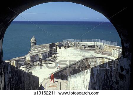 Stock Image -  Puerto Rico, San Juan, fort, Porto Rico, Caribbean, Caribbean Islands, View of the Atlantic Ocean through an arch at Fort San Felipe del Morro (El Morro Castle) in Old San Juan, Puerto Rico. . Fotosearch