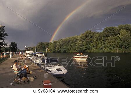 rainbow, Erie Canal, Upstate, New York, Rainbow over the Erie Canal after a thunderstorm in Sylvan Beach in the state of New York. View Large Photo Image Picture - rainbow, Erie Canal, Upstate, New York, Rainbow over the Erie Canal after a thunderstorm in Sylvan Beach in the state of New York.. Fotosearch