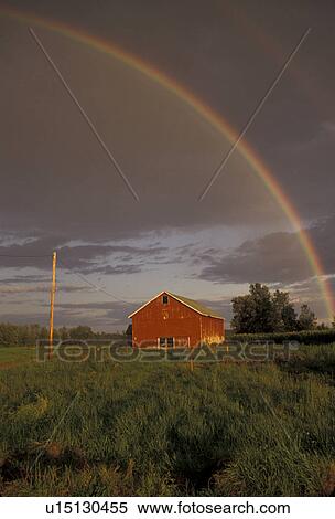 rainbow, Upstate, barn, New York, Rainbow over a red barn after a thunderstorm in Oneida County in the state of New York. View Large Photo Image Stock Photography -  rainbow, Upstate, barn, New York, Rainbow over a red barn after a thunderstorm in Oneida County in the state of New York.. Fotosearch