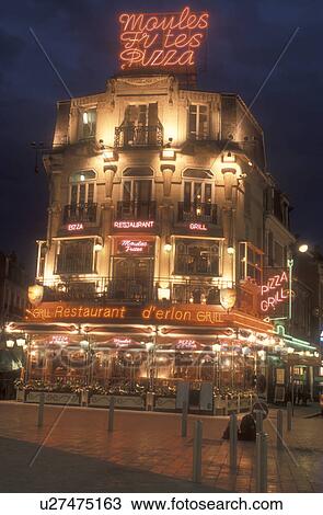 Reims, Champagne Region, France, Marne, Europe, Restaurant in downtown Reims illuminated at night in France. View Large Photo Image Stock Image - Reims, Champagne Region, France, Marne, Europe, Restaurant in downtown Reims illuminated at night in France. . Fotosearch