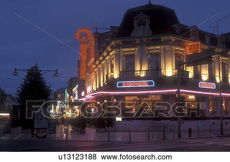 Stock Photo -  Reims, Champagne Region, France, Marne, Europe, Hotel and Restaurant in downtown Reims illuminated at night in France. . Fotosearch