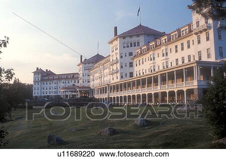 Stock Image -  resort, Bretton Woods, New Hampshire, White Mountains Region, The grand historic Mount Washington Hotel at [sunset, sunrise] in Bretton Woods, New Hampshire. . Fotosearch