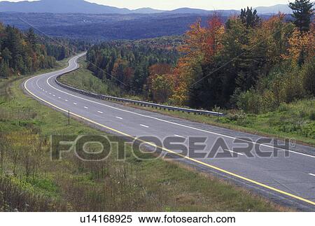 road, autumn, Vermont, Scenic highway I-93 winds through the beautiful colorful forests and mountains of Vermont during the fall. View Large Photo Image Stock Photography - road, autumn, Vermont, Scenic highway I-93 winds through the beautiful colorful forests and mountains of Vermont during the fall.. Fotosearch