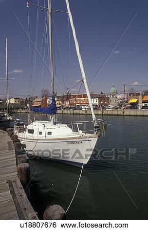 Stock Photograph -  sailboat, yacht, Annapolis, Maryland, Sailboat anchored at City Dock on the harbor in the capital city of Annapolis in the state of Maryland.. Fotosearch