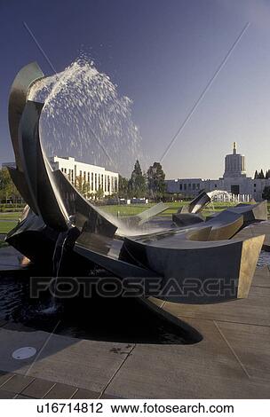 Stock Image -  Salem, State Capitol, State House, Oregon, Fountain sculpture on the grounds of the State Capitol in the capital city of Salem in the state of Oregon. State Capitol Building in the background.. Fotosearch