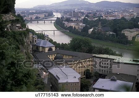 Stock Image -  Salzburg, Austria, Europe, Scenic view of the Salzach River and the city of Salzburg. . Fotosearch