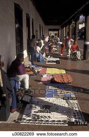 Sante Fe, market, American Indian, New Mexico, Palace of the Governors, Native Americans selling crafts at the Portal in Sante Fe in the state of New Mexico. View Large Photo Image Stock Photo - Sante Fe, market, American Indian, New Mexico, Palace of the Governors, Native Americans selling crafts at the Portal in Sante Fe in the state of New Mexico.. Fotosearch