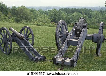 Stock Photo -  Saratoga, cannons, battery, Saratoga National Historical Park, New York, Cannons displayed at Saratoga Nat'l Historical Park in the state of New York.. Fotosearch
