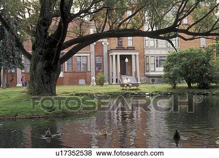 Saratoga Springs, New York, Ducks swimming in a pond at casino (ca. 1870) in Historic Casino and Congress Park in the town of Saratoga Springs in the state of New York., View Large Photo Image Stock Photo - Saratoga Springs, New York, Ducks swimming in a pond at casino (ca. 1870) in Historic Casino and Congress Park in the town of Saratoga Springs in the state of New York., . Fotosearch
