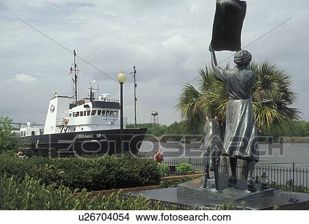 Savannah, Georgia, Statue of Florence Martus the Waving Girl on the Riverfront along the Savannah River in Savannah in the state of Georgia., View Large Photo Image Picture - Savannah, Georgia, Statue of Florence Martus the Waving Girl on the Riverfront along the Savannah River in Savannah in the state of Georgia., . Fotosearch