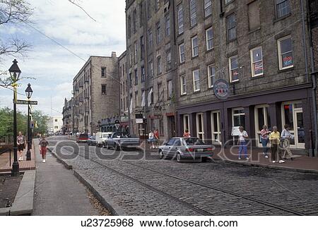 Savannah, Georgia, Waterfront, People walking along the cobblestone River Street in the Historic Riverfront District of Savannah in the state of Georgia. View Large Photo Image Stock Photo - Savannah, Georgia, Waterfront, People walking along the cobblestone River Street in the Historic Riverfront District of Savannah in the state of Georgia. . Fotosearch
