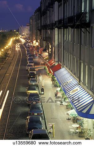 Stock Image -  Savannah, waterfront, Georgia, Scenic view of the cobblestone River Street at night in the Historic Riverfront District of Savannah in the state of Georgia. . Fotosearch