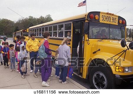 school bus, bus, Children and adults boarding a yellow school bus for a field trip in Lionville in the state of Pennsylvania View Large Photo Image Stock Photograph - school bus, bus, Children and adults boarding a yellow school bus for a field trip in Lionville in the state of Pennsylvania . Fotosearch