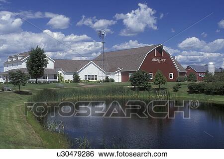 Shipshewana, Indiana, The Menno-Hof Mennonite Visitors Center reflects in the pond in Shipshewana View Large Photo Image Stock Photograph - Shipshewana, Indiana, The Menno-Hof Mennonite Visitors Center reflects in the pond in Shipshewana . Fotosearch