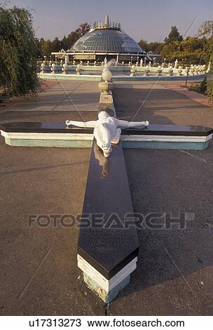 Stock Image -  shrine, New York, One of the life size statues in the outdoor cathedral at the National Shrine Basilica of Our Lady of Fatima in Lewistown in the state of New York . Fotosearch