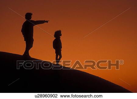 Silhouette, overlook, people, Stone Mountain, Georgia's Stone Mountain Park, Atlanta, Georgia, Silhouette of mother and young daughter watching/looking sunset on the summit of Stone Mountain in Georgia's Stone Mt. Park near Atlanta in the state of Georgi View Large Photo Image Stock Image - Silhouette, overlook, people, Stone Mountain, Georgia's Stone Mountain Park, Atlanta, Georgia, Silhouette of mother and young daughter watching/looking sunset on the summit of Stone Mountain in Georgia's Stone Mt. Park near Atlanta in the state of Georgi. Fotosearch