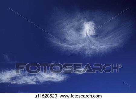 Stock Photo -  sky, clouds, Vermont, Wispy clouds against a clear blue sky. . Fotosearch