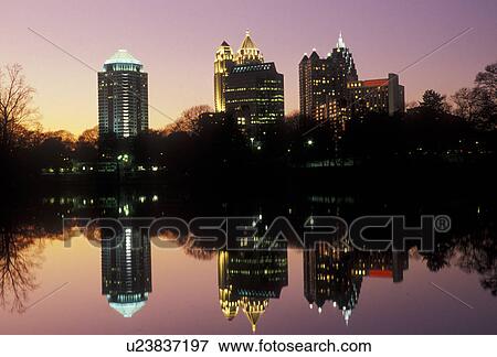 skyline, Atlanta, midtown, Georgia, Reflection of Atlanta's Midtown skyline at sunset from the pond at Piedmont Park in the state of Georgia. View Large Photo Image Stock Photo - skyline, Atlanta, midtown, Georgia, Reflection of Atlanta's Midtown skyline at sunset from the pond at Piedmont Park in the state of Georgia.. Fotosearch