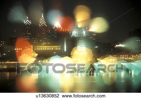 skyline, Philadelphia, Pennsylvania, A blur of the illuminated skyline of downtown Philadelphia from the Delaware River in the evening, Pennsylvania. View Large Photo Image Stock Image - skyline, Philadelphia, Pennsylvania, A blur of the illuminated skyline of downtown Philadelphia from the Delaware River in the evening, Pennsylvania.. Fotosearch