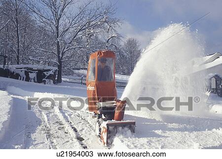 snowblower, Vermont, Man snow blowing his driveway with a snowblower after a snowstorm in East Montpelier Center in Washington County in the state of Vermont View Large Photo Image Stock Image - snowblower, Vermont, Man snow blowing his driveway with a snowblower after a snowstorm in East Montpelier Center in Washington County in the state of Vermont . Fotosearch