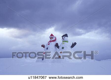 snowman, Vermont, VT, Snowman and snowwoman on a snow-covered hill in winter View Large Photo Image Stock Photo - snowman, Vermont, VT, Snowman and snowwoman on a snow-covered hill in winter. Fotosearch