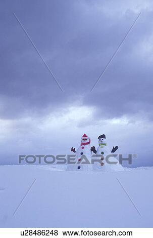 snowman, Vermont, VT, Snowman couple on a snow-covered hill in winter View Large Photo Image Stock Photo - snowman, Vermont, VT, Snowman couple on a snow-covered hill in winter. Fotosearch