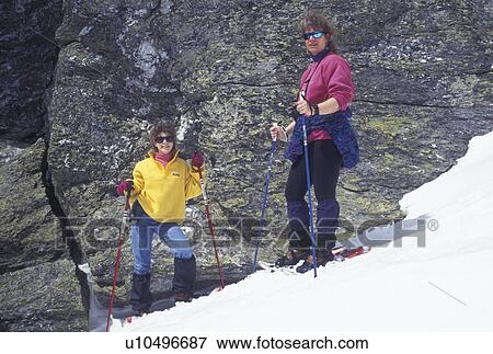 snowshoeing, Vermont, VT, Mother and daughter snowshoeing on top of Mt. Mansfield in Stowe in winter. View Large Photo Image Stock Photo - snowshoeing, Vermont, VT, Mother and daughter snowshoeing on top of Mt. Mansfield in Stowe in winter.. Fotosearch