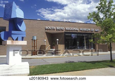 Stock Image -  South Bend, Indiana, A blue sculpture stands in front of the South Bend Museum of Art . Fotosearch