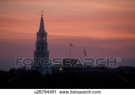 South Carolina, Charleston, The steeple of St. Michael's Episcopal Church and rooftops of the buildings at sunset in downtown Charleston, South Carolina. View Large Photo Image Stock Image - South Carolina, Charleston, The steeple of St. Michael's Episcopal Church and rooftops of the buildings at sunset in downtown Charleston, South Carolina.. Fotosearch