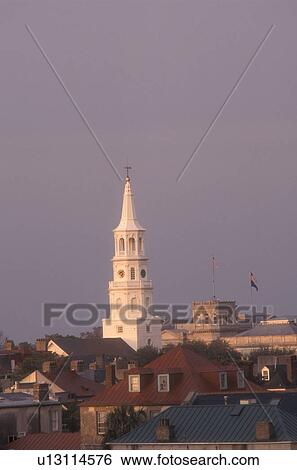 South Carolina, Charleston, The steeple of St. Michael's Episcopal Church and rooftops of the buildings in downtown Charleston, South Carolina. View Large Photo Image Stock Photograph - South Carolina, Charleston, The steeple of St. Michael's Episcopal Church and rooftops of the buildings in downtown Charleston, South Carolina.. Fotosearch