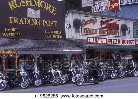 South Dakota, Black Hills, Motorcycles parked outside Rushmore Trading Post and gift shops during bike week in the Black Hills in Keystone View Large Photo Image Stock Photograph - South Dakota, Black Hills, Motorcycles parked outside Rushmore Trading Post and gift shops during bike week in the Black Hills in Keystone . Fotosearch