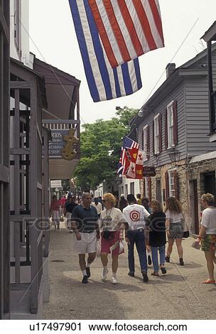 Stock Image -  St. Augustine, Florida, Tourist walk along St. George Street a walking mall in the old city of Saint Augustine in the state of Florida. St. Augustine is the oldest settlement in the United States . Fotosearch