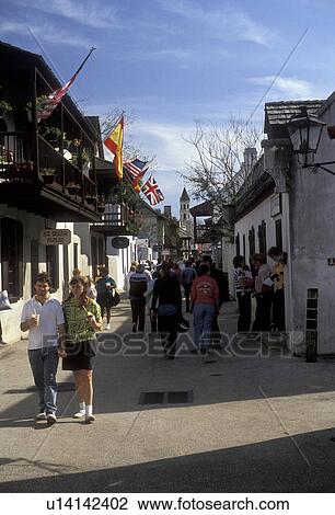 Stock Image -  St. Augustine, Florida, Tourists walking on Saint George Street in the Old City of Saint Augustine in the state of Florida., . Fotosearch