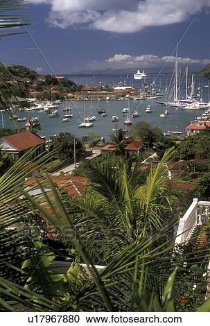 St. Barthelemy, Caribbean, Saint Barts, Gustavia, St. Barts, Caribbean Islands, Picturesque aerial view of the harbor in Gustavia the capital of the island of Saint Barthelemy (a department of Guadeloupe). View Large Photo Image Stock Image - St. Barthelemy, Caribbean, Saint Barts, Gustavia, St. Barts, Caribbean Islands, Picturesque aerial view of the harbor in Gustavia the capital of the island of Saint Barthelemy (a department of Guadeloupe).. Fotosearch