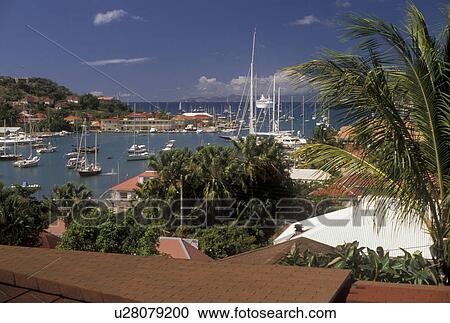 St. Barts, Caribbean, Gustavia, St. Barthelemy, Saint Barts, Caribbean Islands, Scenic aerial view of the harbor on the Caribbean Sea in Gustavia the capital of the island of Saint Barthelemy (a department of Guadeloupe). View Large Photo Image Stock Image - St. Barts, Caribbean, Gustavia, St. Barthelemy, Saint Barts, Caribbean Islands, Scenic aerial view of the harbor on the Caribbean Sea in Gustavia the capital of the island of Saint Barthelemy (a department of Guadeloupe).. Fotosearch