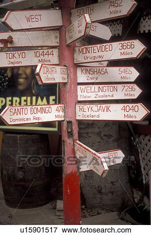 St. Maarten, Caribbean, sign, Caribbean Islands, Signs showing distances in downtown Philipsburg capital on the island of Sint Maarten (dutch part). View Large Photo Image Stock Photo - St. Maarten, Caribbean, sign, Caribbean Islands, Signs showing distances in downtown Philipsburg capital on the island of Sint Maarten (dutch part).. Fotosearch