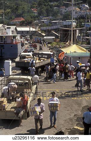 St. Vincent, Caribbean, Kingstown, Caribbean Islands, People unloading goods from boats on a busy dock in Kingstown on the island of Saint Vincent (a British Commonwealth member). View Large Photo Image Stock Photograph - St. Vincent, Caribbean, Kingstown, Caribbean Islands, People unloading goods from boats on a busy dock in Kingstown on the island of Saint Vincent (a British Commonwealth member).. Fotosearch