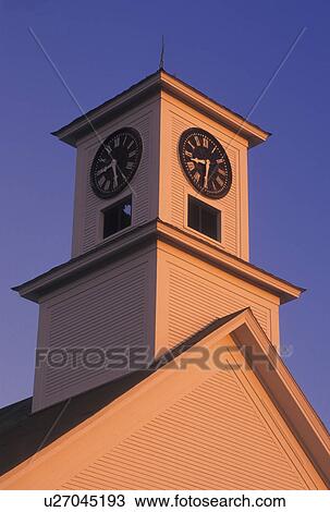Stock Image -  steeple, church, Vermont, Early morning light on the United Methodist Church steeple in Binghamville in Franklin County in the state of Vermont.. Fotosearch